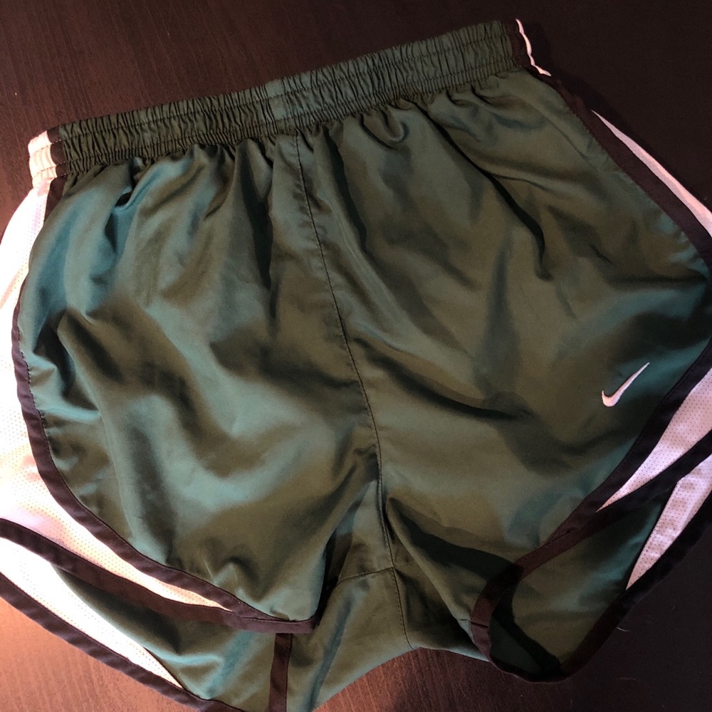 green nike shorts